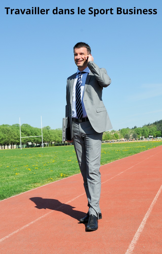 Homme en costume sur une piste d'athlétisme, symbolisant une carrière dans le Sport Business